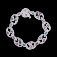 Pulsera con diamantes de laboratorio en forma de flor Yin Yang rosa y azul – Oro de 14k