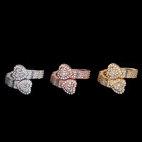 Anillo de oro de 14k con diseño de diamante de laboratorio baguette, con doble corazón y lazo