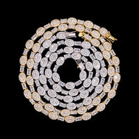 Collar de tenis con diamantes de laboratorio ovalados y baguette de oro de 14k