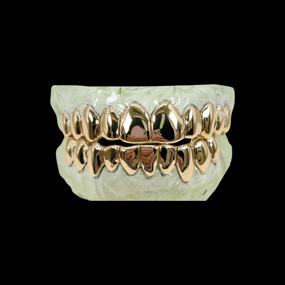 Grillz de oro de 14 quilates (285 $ por diente)